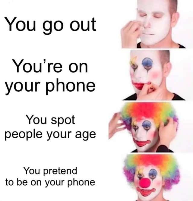 Putting on clown makeup meme pretend on phone to avoid peers