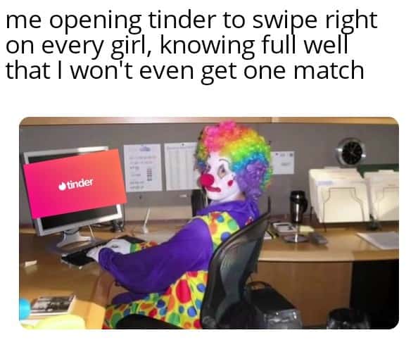 Clown computer meme at his desk swiping Tinder knowing no matches will land