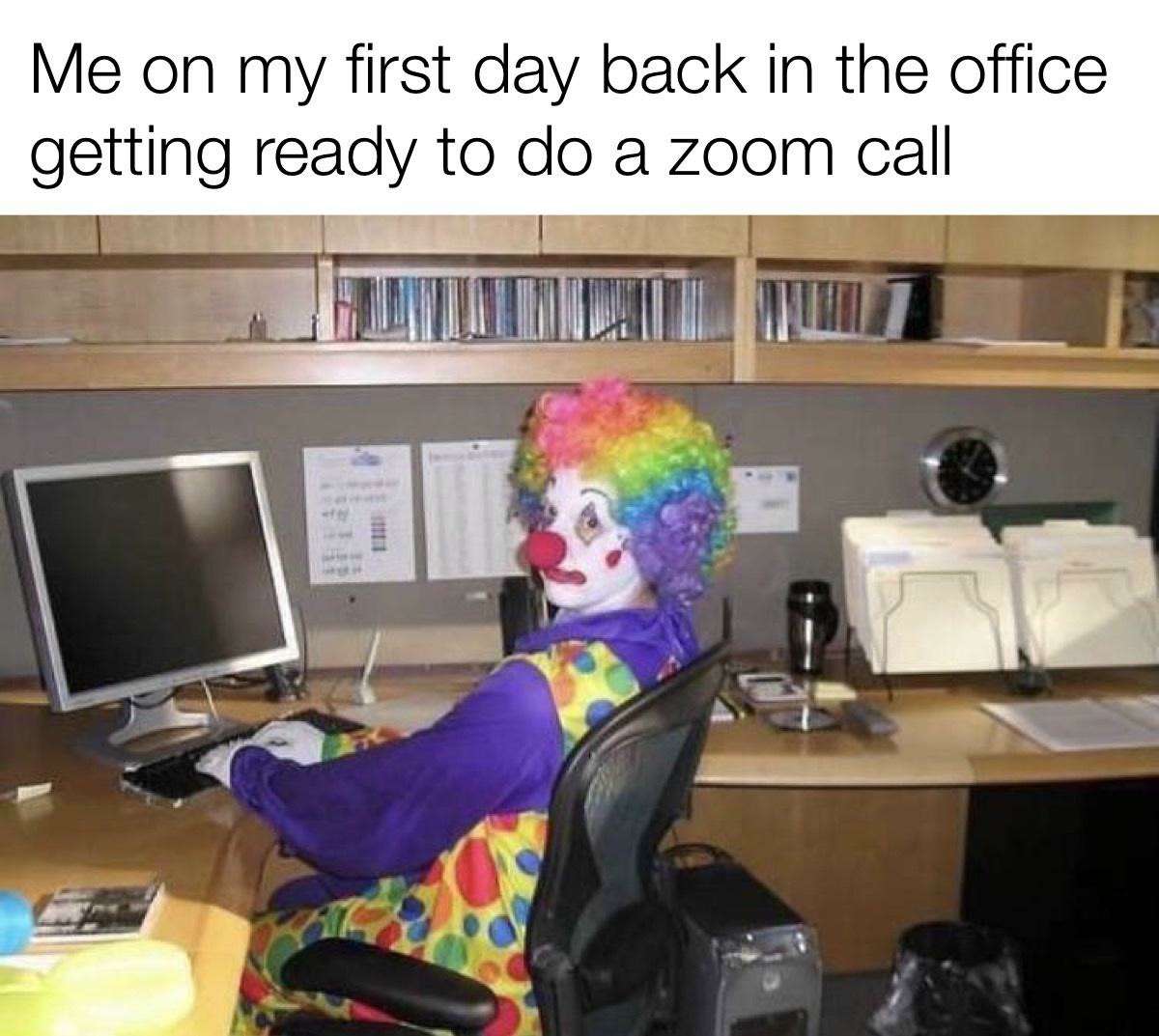 Clown computer meme typing at desk before a zoom call