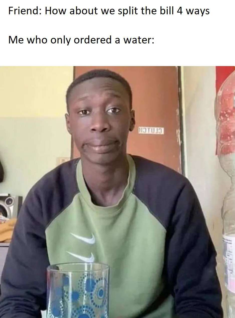 Awkward black guy meme forced to split bill 4 ways when he only ordered a water