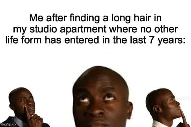 Thinking black guy meme finding a random hair in apartment