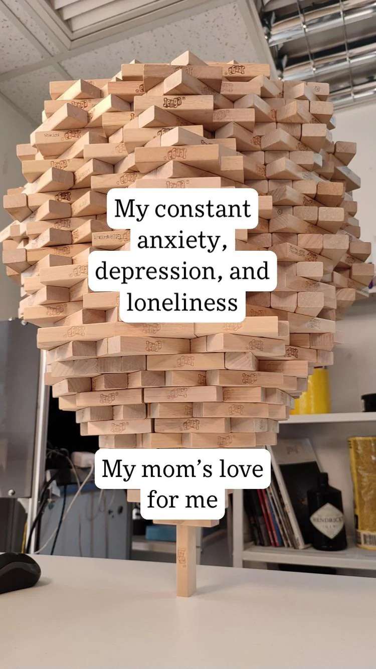 Jenga tower meme showing mom's love supporting mental health struggles