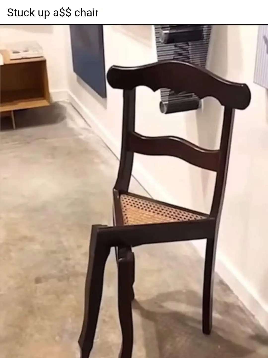 Stuck up chair meme leaning against wall sticking its butt out acting arrogant