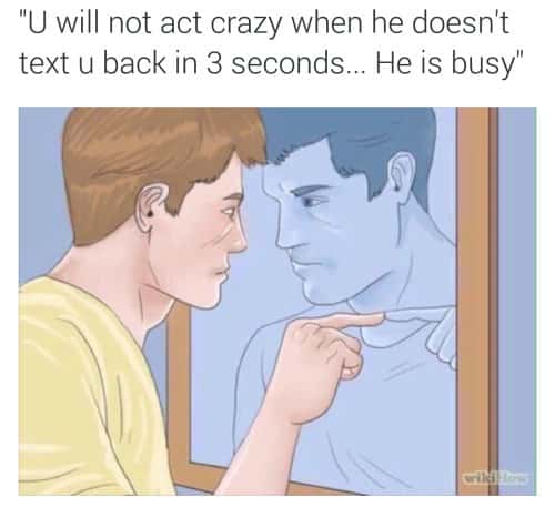 Man pointing in mirror meme about waiting for text reply