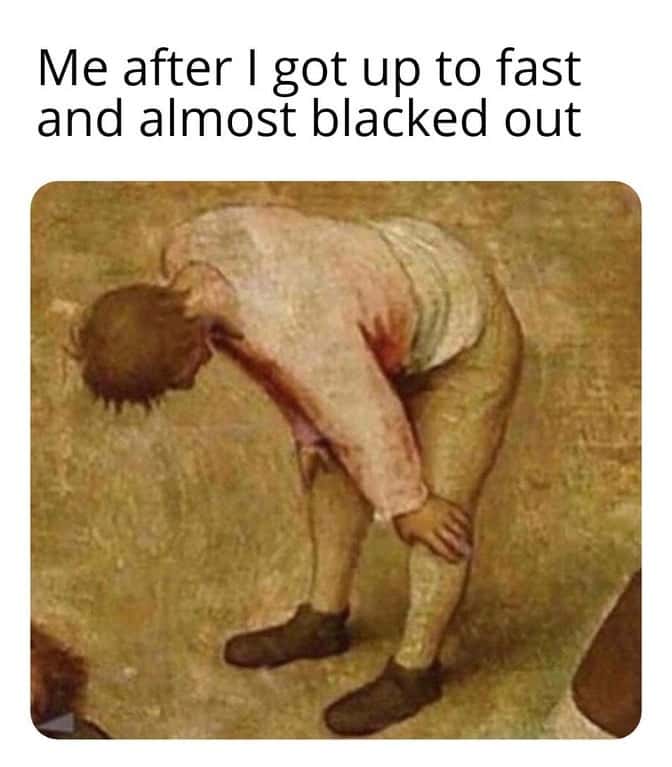 Tired man hands on knees meme dizzy from standing up fast