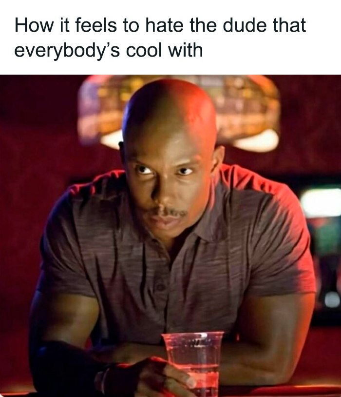 Doakes meme side-eyeing at the bar hating the dude that everybody's cool with
