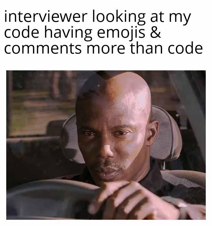 Doakes meme staring unimpressed at interviewer looking at code with more emojis and comments than code