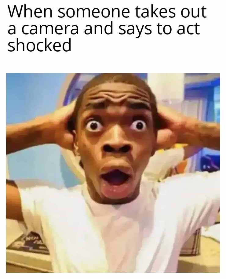 Shocked black guy meme acting shocked for camera