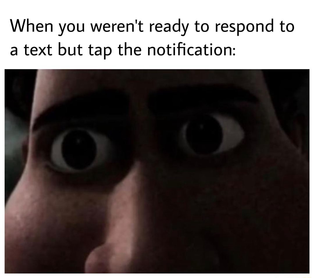 Wide staring meme taps text notification panicking